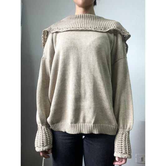 SWEATER BEIGE CON VUELOS